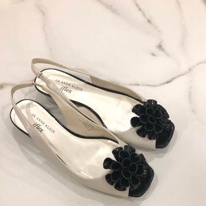 pair of pretty black and white flora sandals
